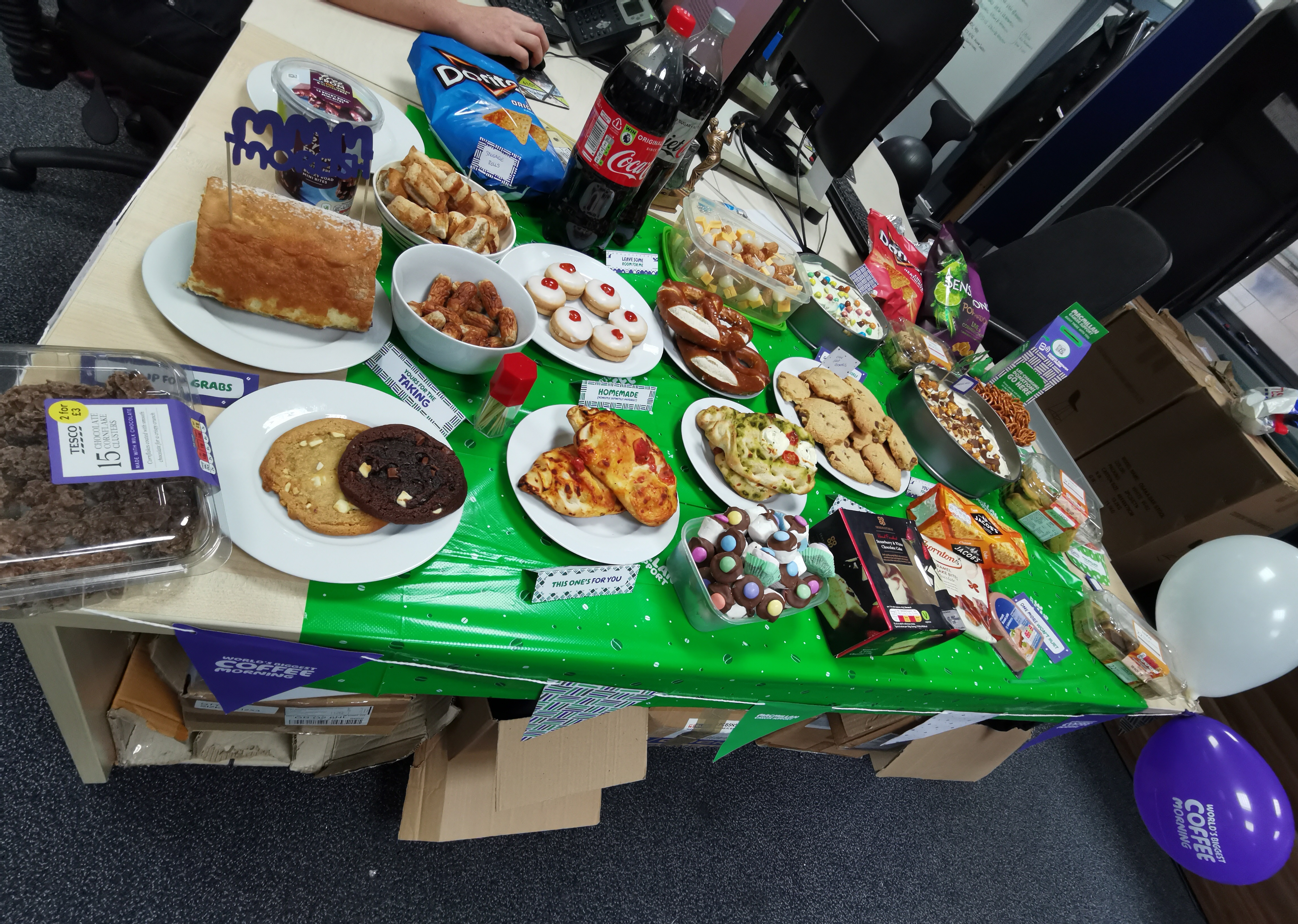 bake sale table spread macmillan cancer support